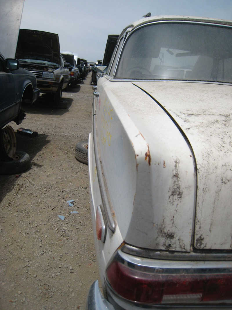 Illustration for article titled Happy Tailfins And All, This 1965 Mercedes-Benz 190c Is Crusher-Bound